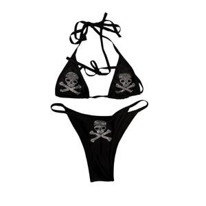 String bikini black with skull and bones rhinestones. Padding in top. Size small